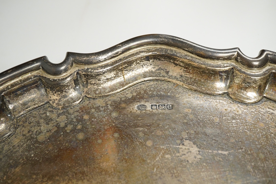 A George V silver circular salver with pie crust border and engraved armorial, by Alexander Clark Co. Ltd, Sheffield, 1922, 39.8cm, 49oz.